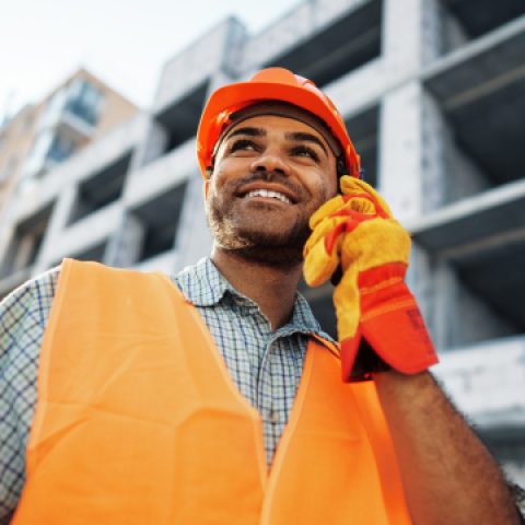 young-construction-worker-in-uniform-using-walkie-2021-09-29-23-12-25-utc.jpg